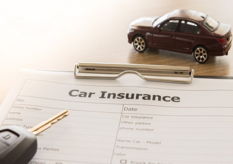 Car insurance form with car keys