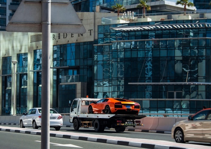 Imported car on back of truck